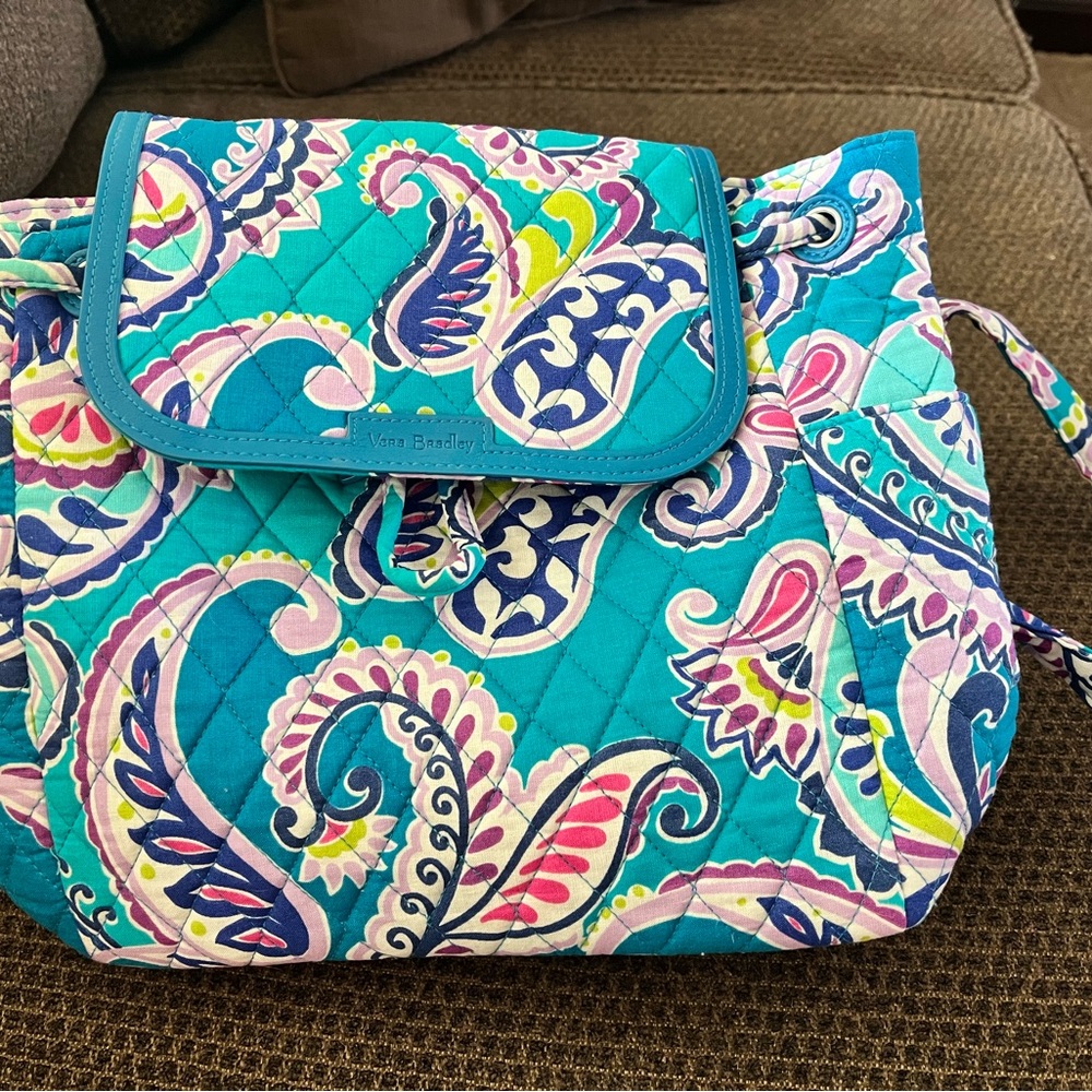 New with tags Vera Bradley Paisley purse/backpack. Never used.